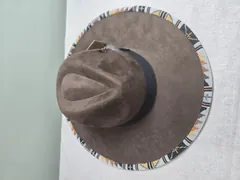Brown Suede Cowboy Hat with Beaded Brim and Feather Accent